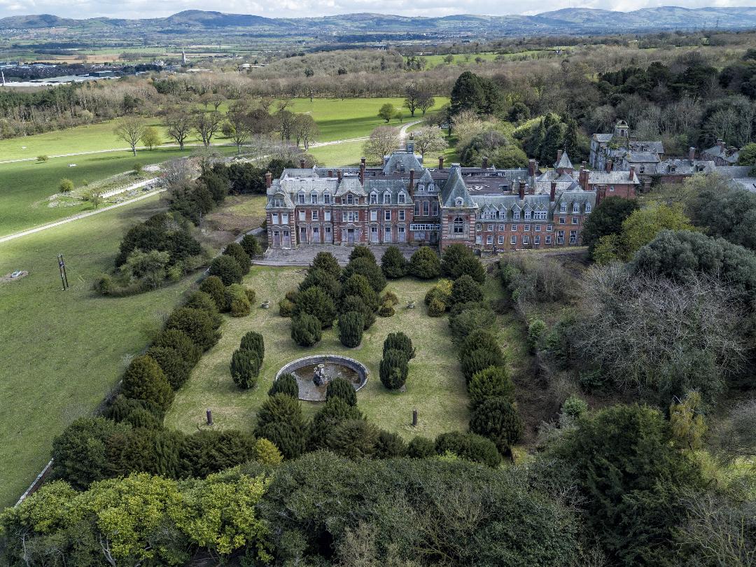 Aerial view of Kinmel Hall historic estate in North Wales surrounded by parkland and gardens
