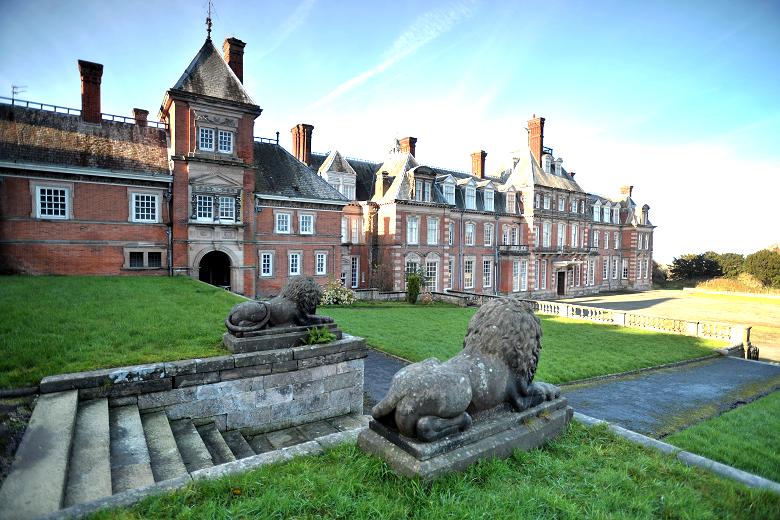 Kinmel Hall historic estate in North Wales with Victorian architecture and stone lion statues